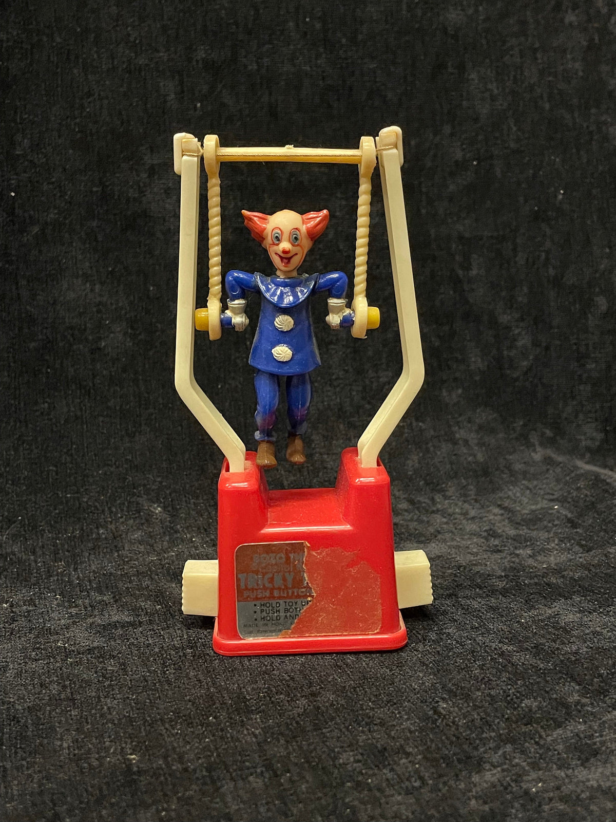 Tricky Trapeze Bozo Clown - Push Button Acrobat