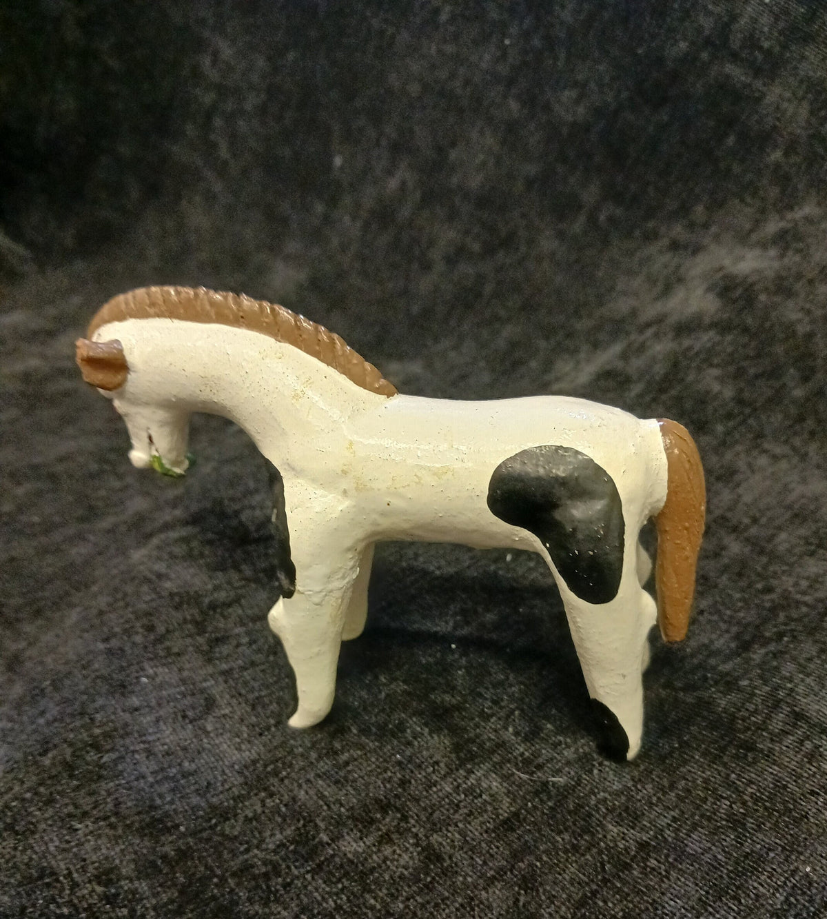 Primitive Metal Horse Figurine - Hand Painted Horse figure with Leaves in Mouth