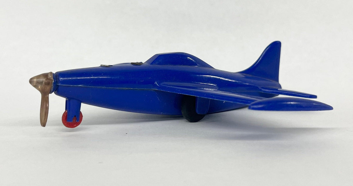 USAF Plastic Blue Fighter Jet  - Argo Plastic Fighter Jet - Propeller Missing 2 Blades - push buttons on nose to reverse propeller spin