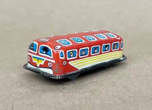 Tin Litho City Bus -  Small Friction Toy  - Caricatures of Classic Passengers in Windows - Made in Japan 1950s - Fine Condition, Wheels Work