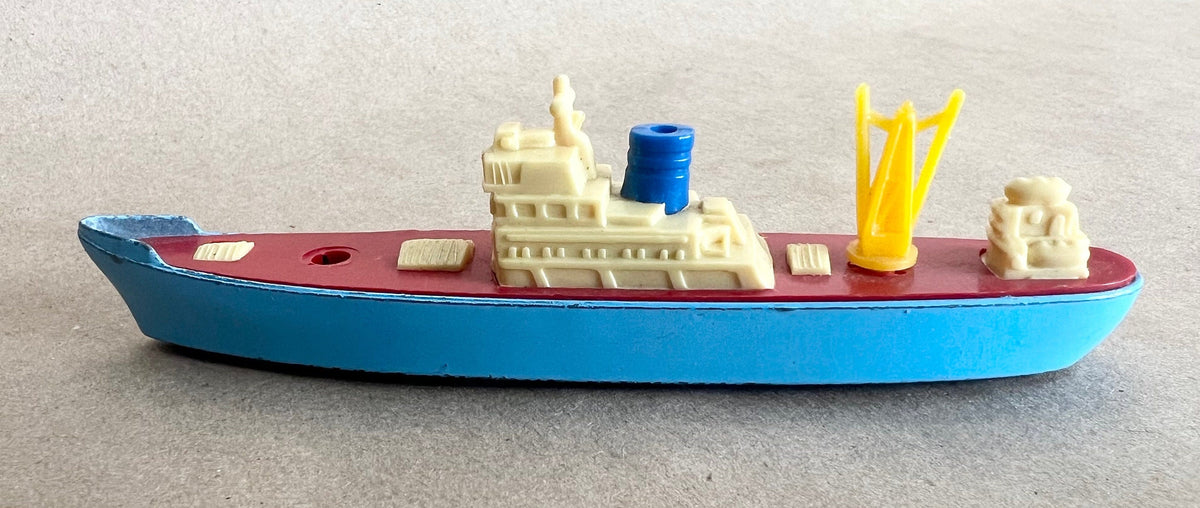 Metal Die Cast Cargo Ship in Blue Color- Tootsie Toy-1960's- Missing one small piece - original wheels in working condition - unusual color