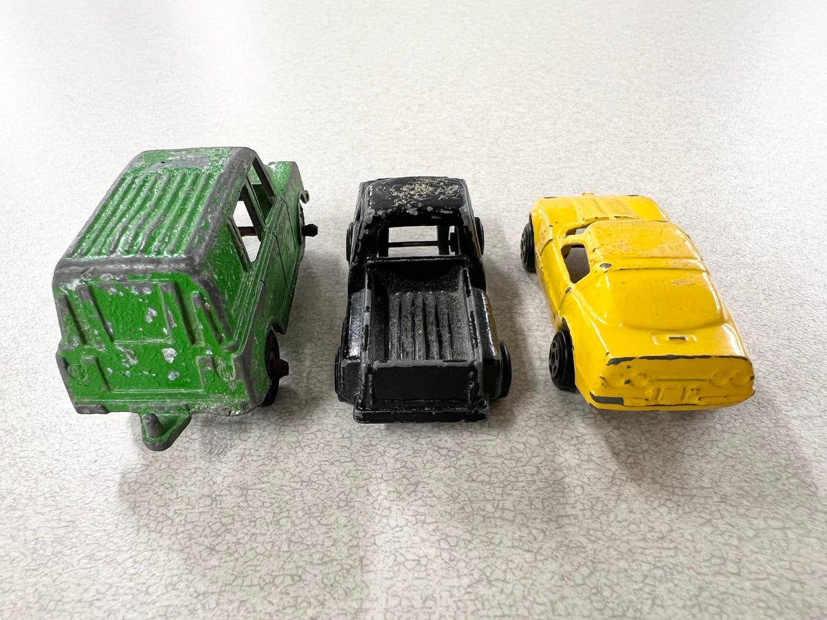 1970s Tootsie Toy Set Of Three- Green Land Rover- Yellow Chevy Corvette- Black Chevy Pick Up Truck- Original Paint And Tires - sold as a set