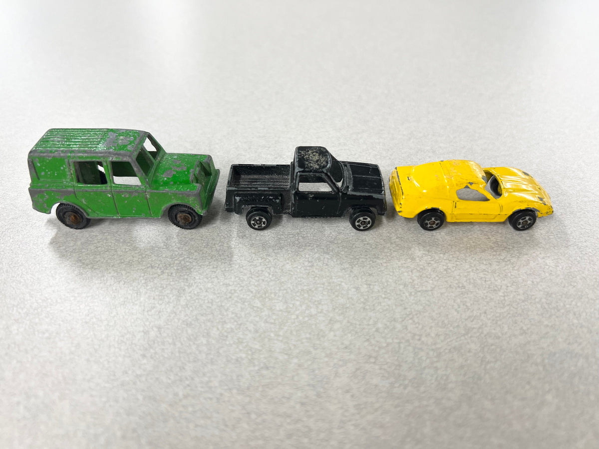 1970s Tootsie Toy Set Of Three- Green Land Rover- Yellow Chevy Corvette- Black Chevy Pick Up Truck- Original Paint And Tires - sold as a set