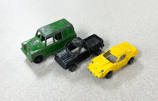 1970s Tootsie Toy Set Of Three- Green Land Rover- Yellow Chevy Corvette- Black Chevy Pick Up Truck- Original Paint And Tires - sold as a set