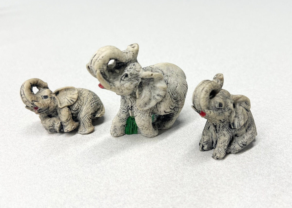 Carved Stone Elephants  - Set of three - Mother Elephant and two Young Elephants - One Elephant Sitting, one Lounging - Realistic Elephants