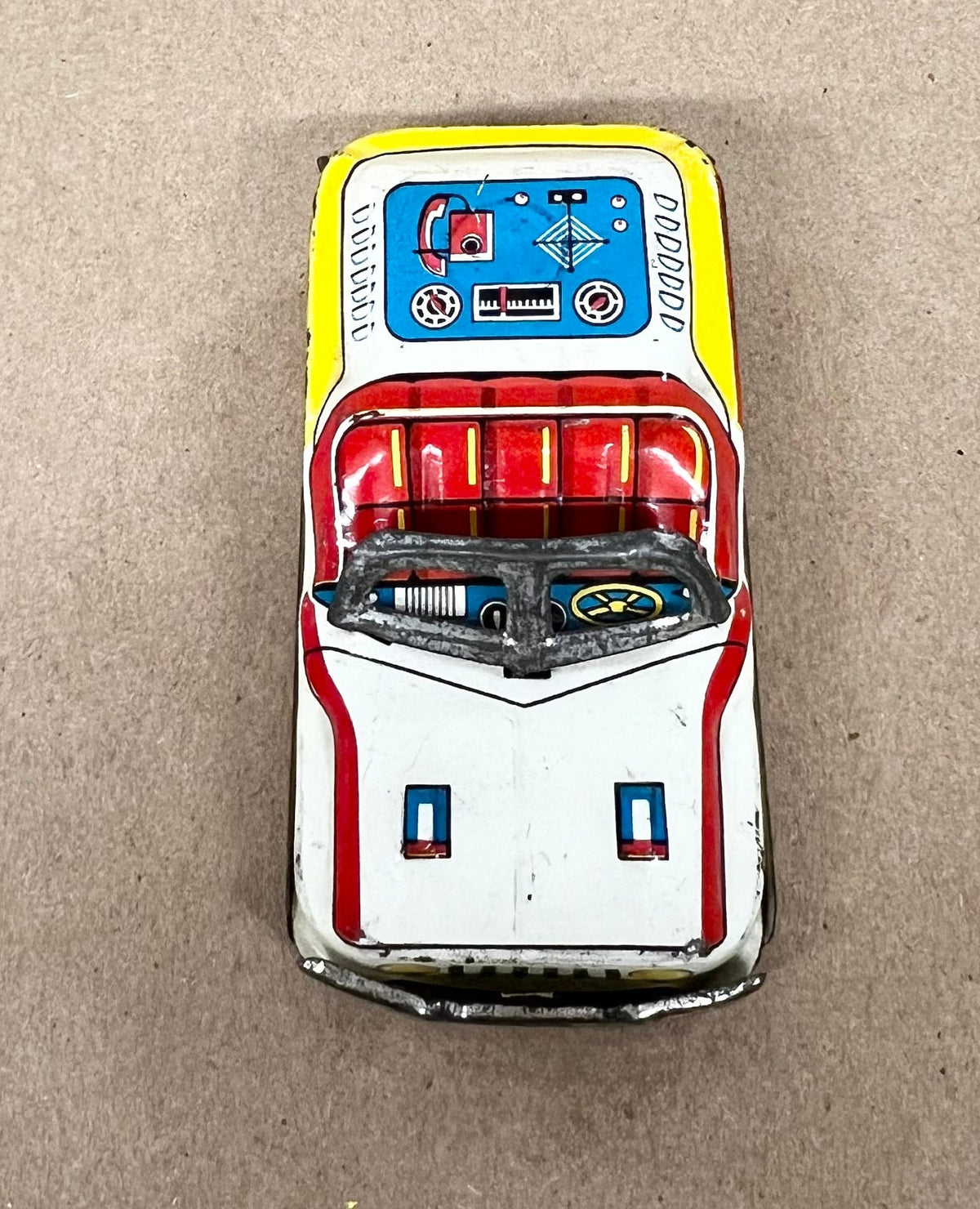 Tin Litho FRICTION Police car- Made in Japan 1950s - Friction sound works - Original Tires - Car runs but not far Police equipment in litho