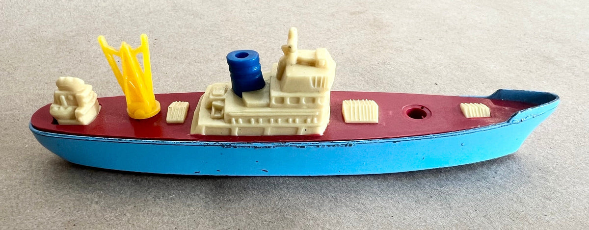 Metal Die Cast Cargo Ship in Blue Color- Tootsie Toy-1960's- Missing one small piece - original wheels in working condition - unusual color