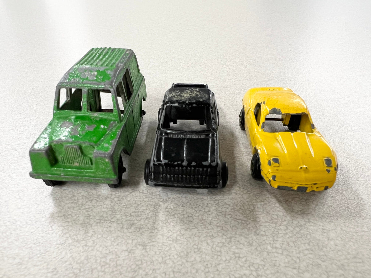 1970s Tootsie Toy Set Of Three- Green Land Rover- Yellow Chevy Corvette- Black Chevy Pick Up Truck- Original Paint And Tires - sold as a set