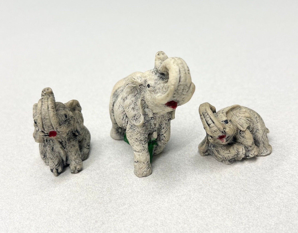Carved Stone Elephants  - Set of three - Mother Elephant and two Young Elephants - One Elephant Sitting, one Lounging - Realistic Elephants