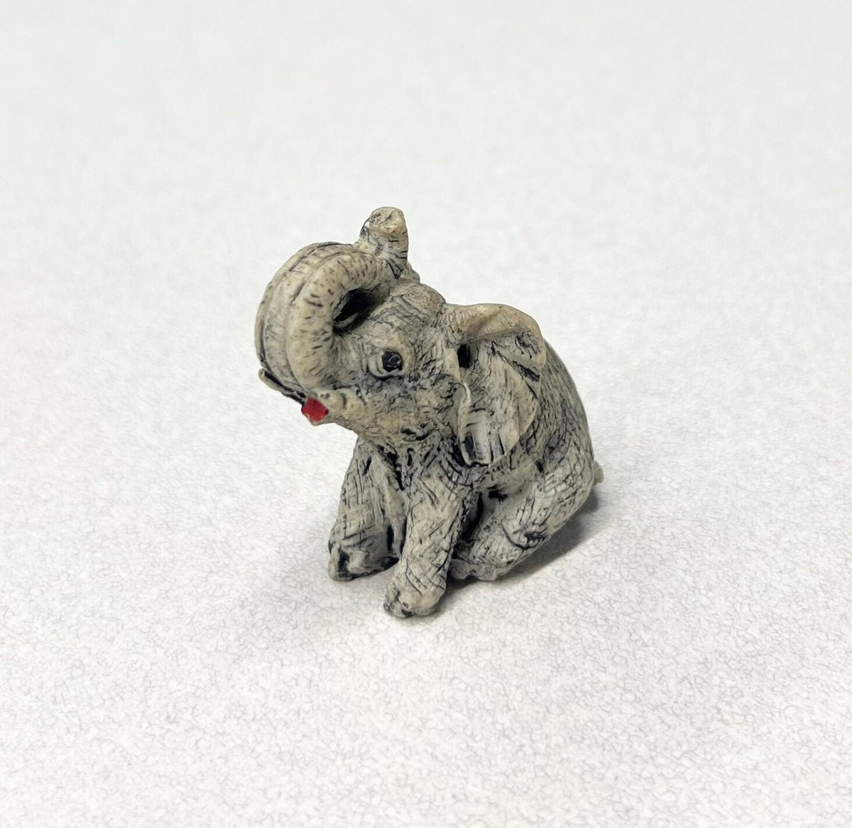 Carved Stone Elephants  - Set of three - Mother Elephant and two Young Elephants - One Elephant Sitting, one Lounging - Realistic Elephants