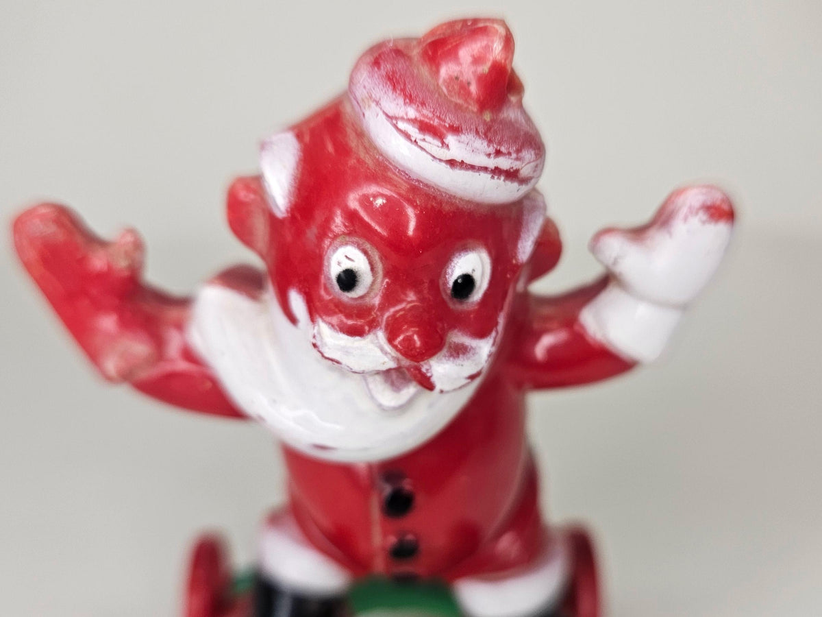 1950's Rosbro - Santa On Wheels Pull Toy and Candy Container - Hard Plastic Santa Candy Container -  Missing  Christmas stocking on Rt Hand