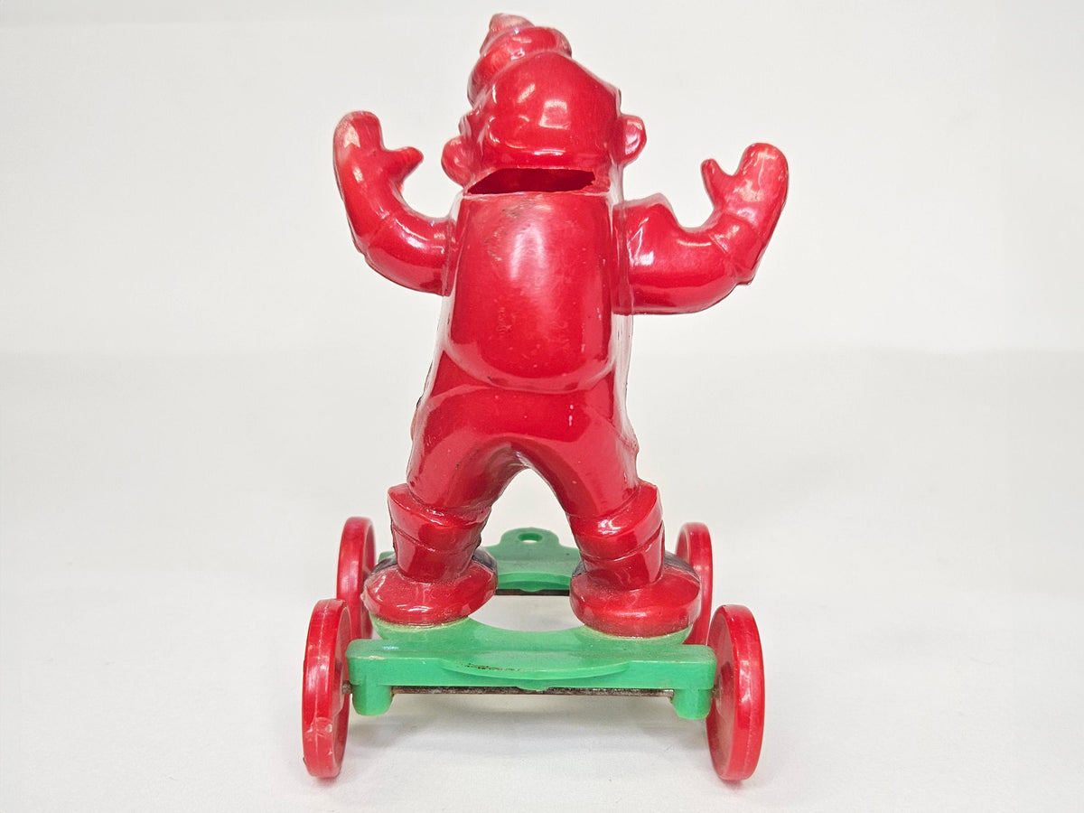 1950's Rosbro - Santa On Wheels Pull Toy and Candy Container - Hard Plastic Santa Candy Container -  Missing  Christmas stocking on Rt Hand
